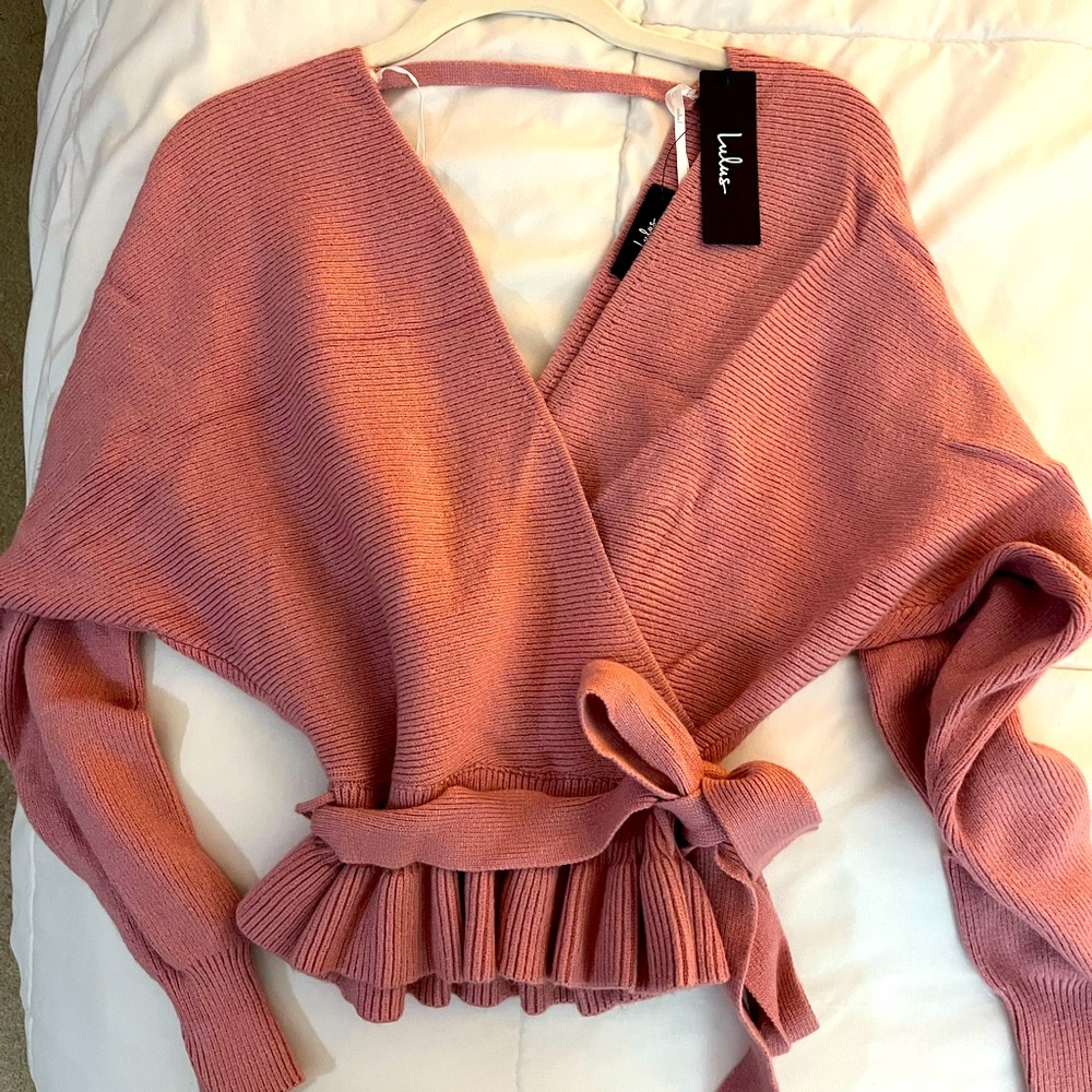 Lulus small tie sweater. Runs large. Brand new